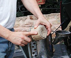 hauteur par rapport à la hauteur du foyer de l'enfumoir